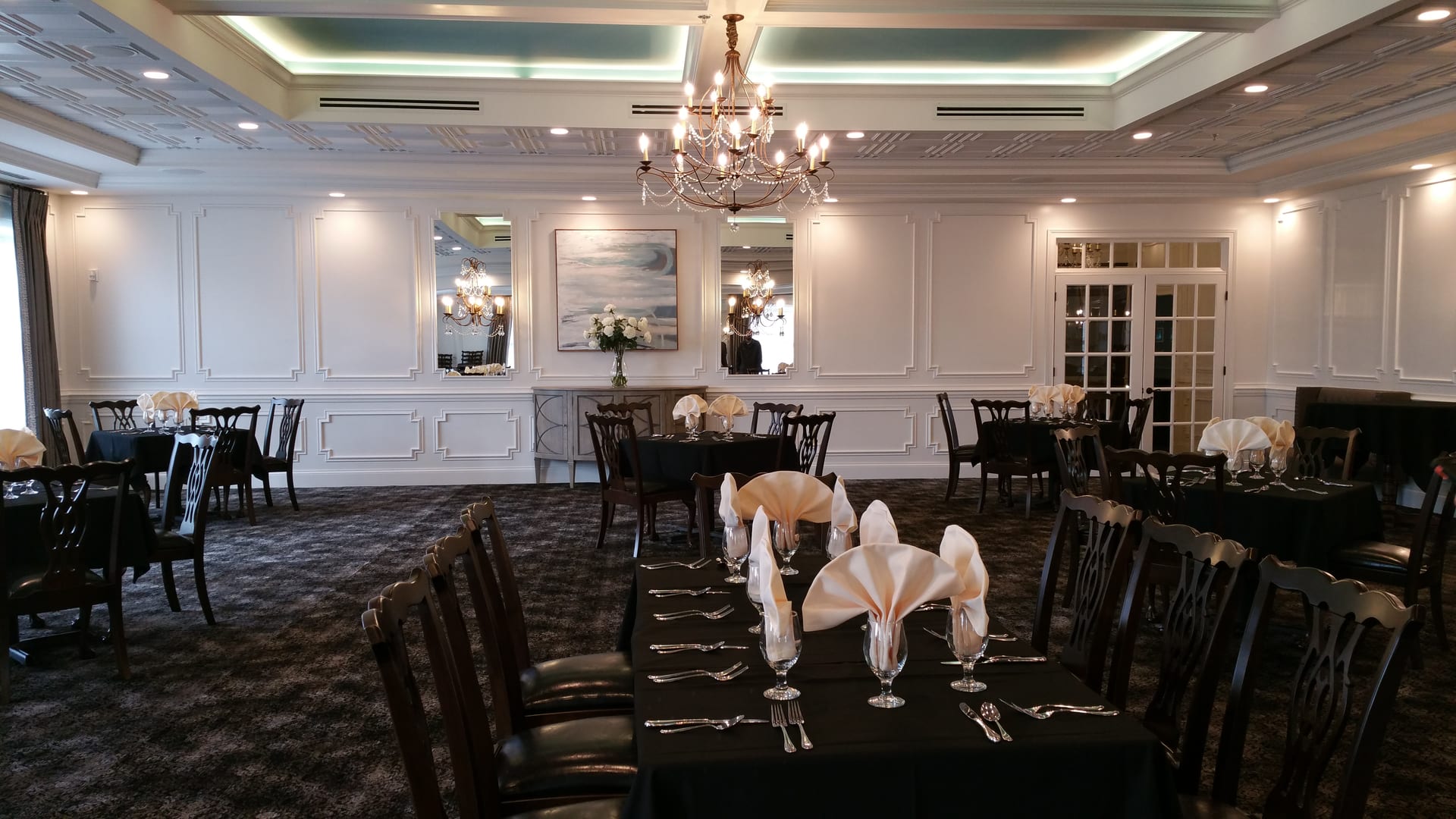 Ballroom event space at Harbour Trees with integrated Noble A-V audio, video, and stage AV