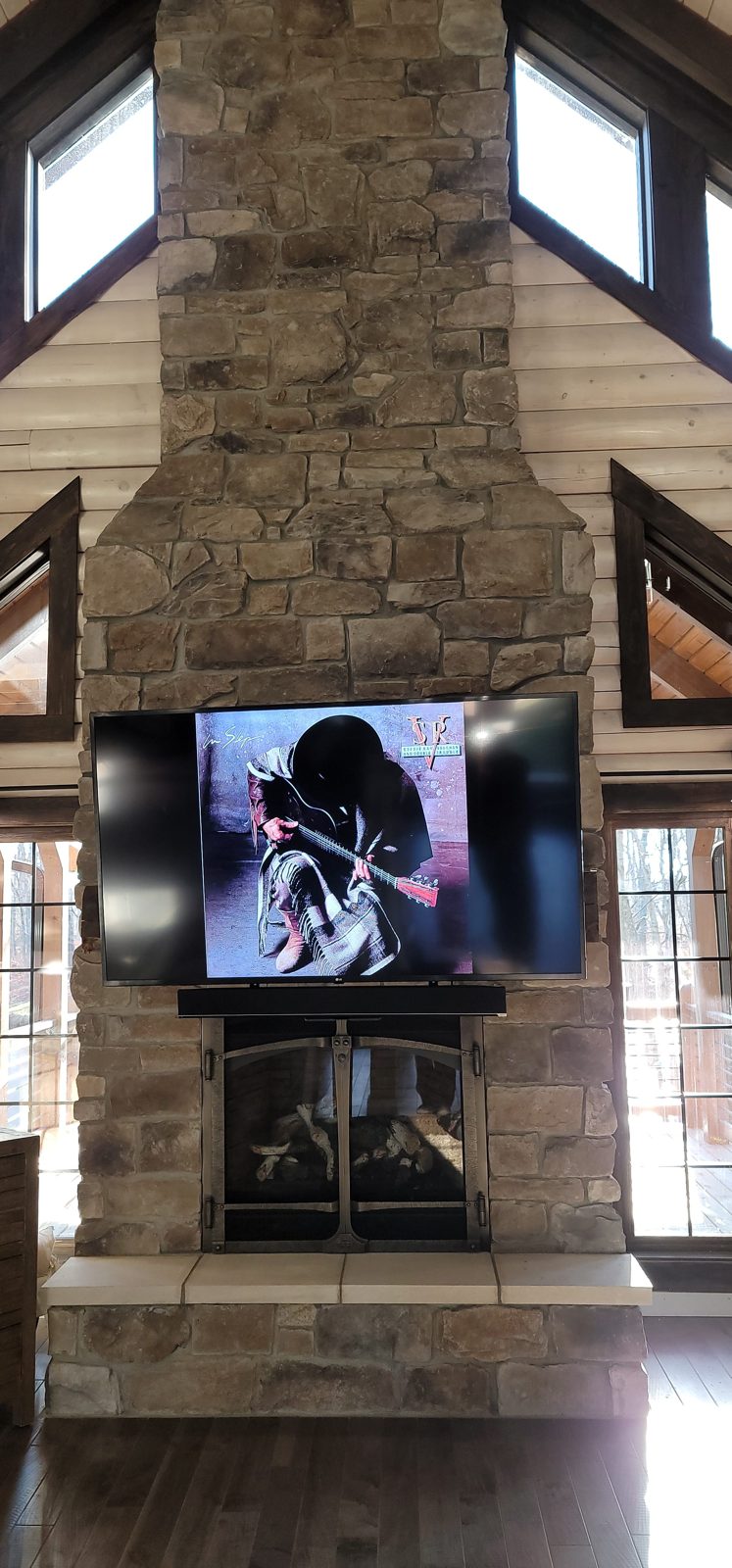 Samsung Frame TV elegantly mounted in a luxury home by Noble A-V